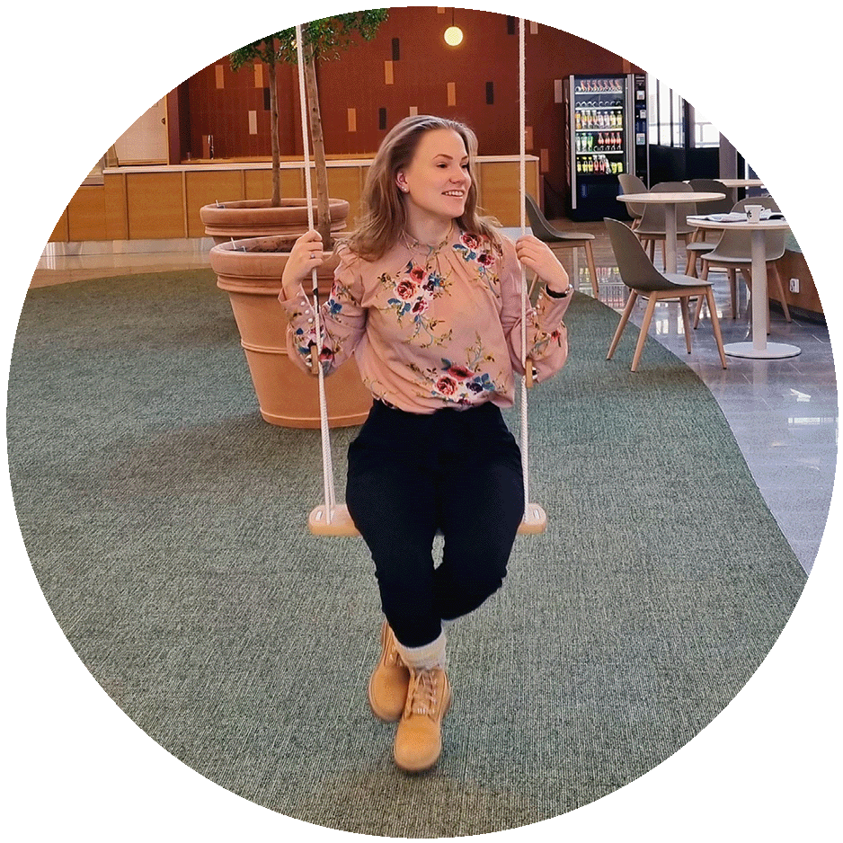 Picture of Melina Weckman sitting in a swing Picture of Melina Weckman sitting in a swing
